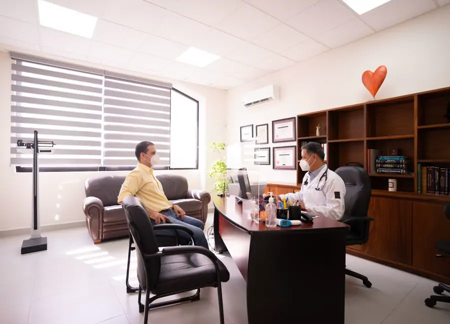 Doctor consulting with a patient in a modern medical office